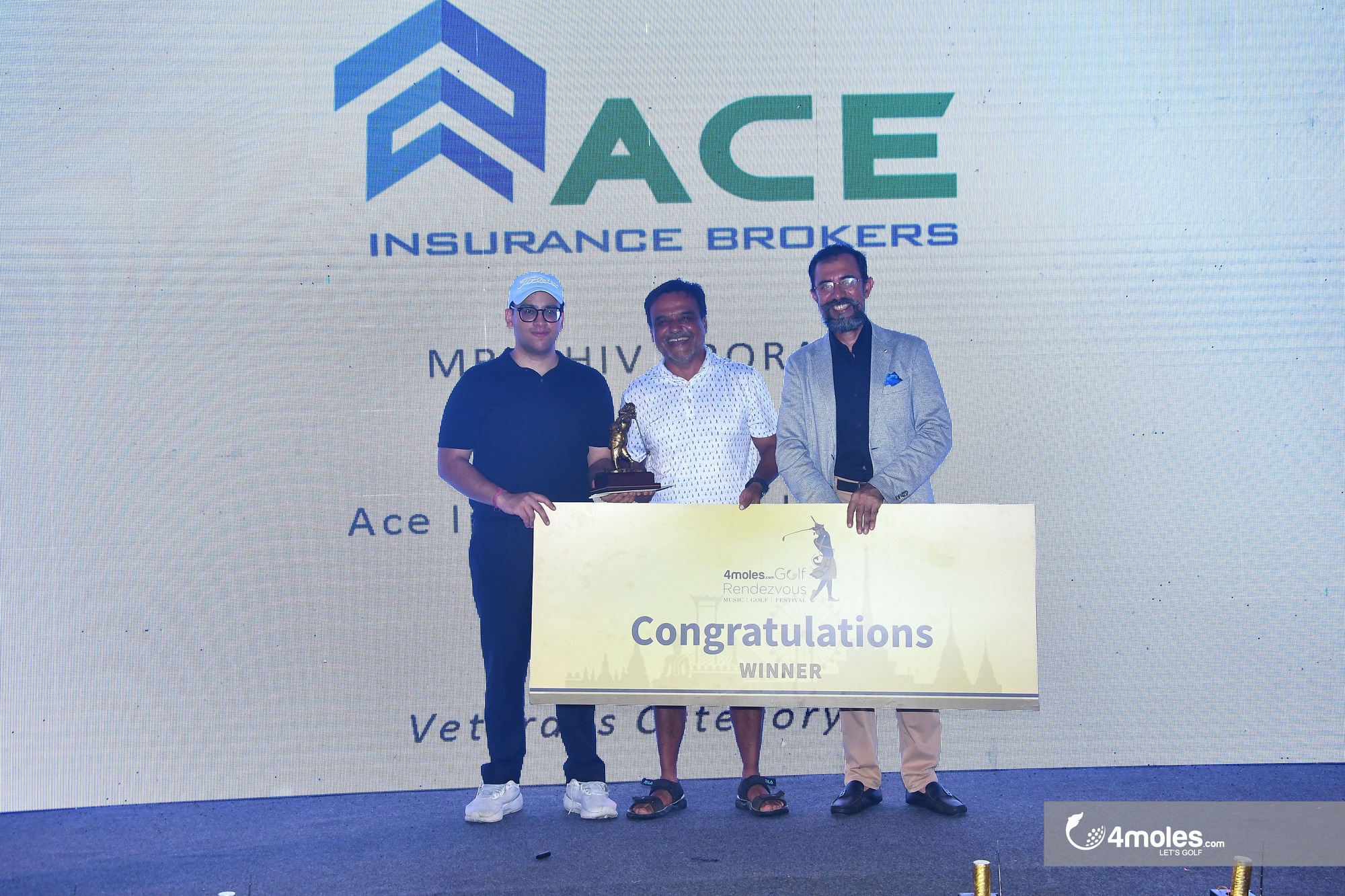 Col Bains is getting  GOLF GANESHA + Trip To Bangkok + Srixon Travel Bag + Truefitt & Hill Vouchers by Shiv Arora,  Director, Ace Insurance Brokers