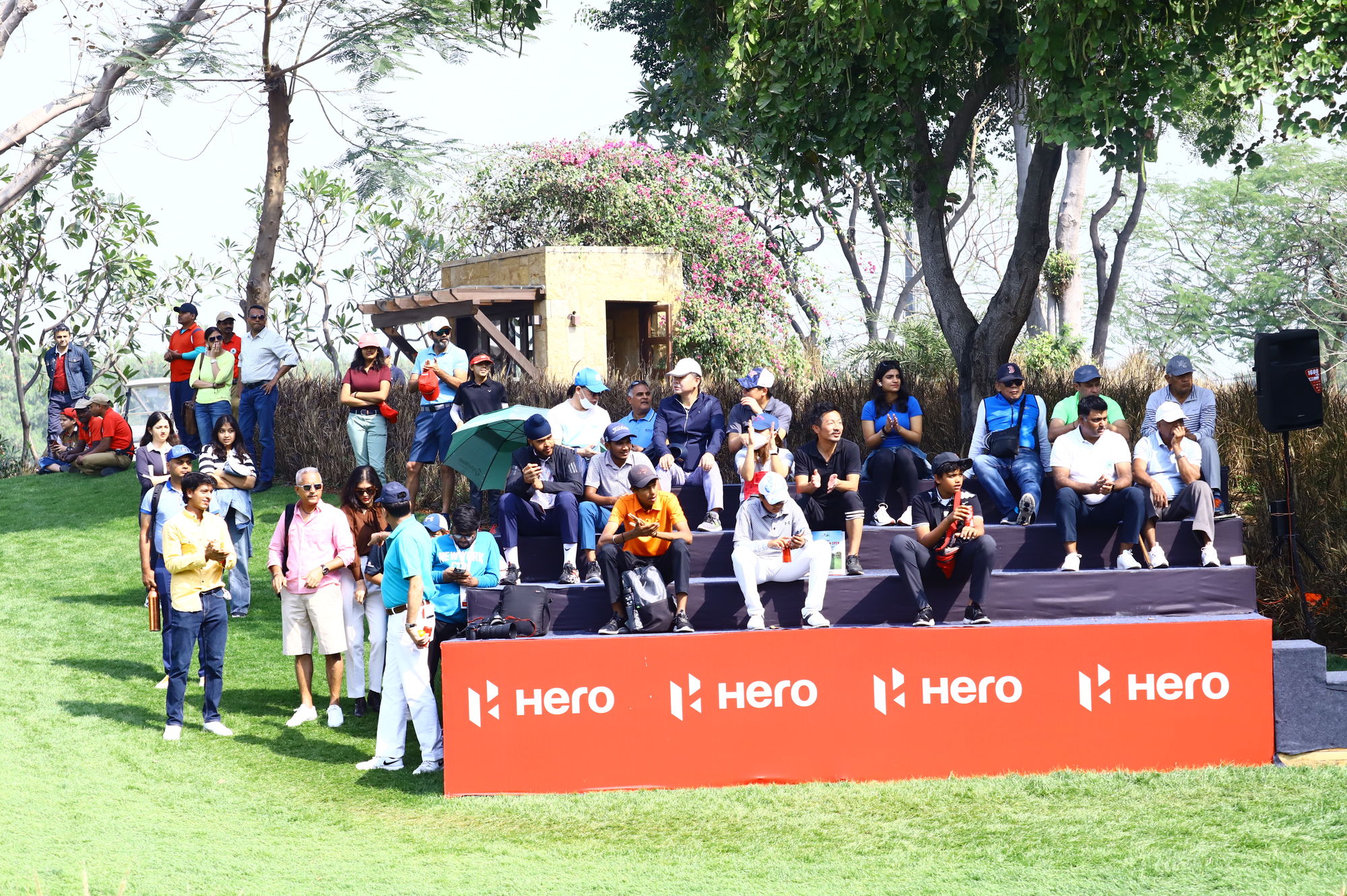Audience cheering for the golfers at DLF