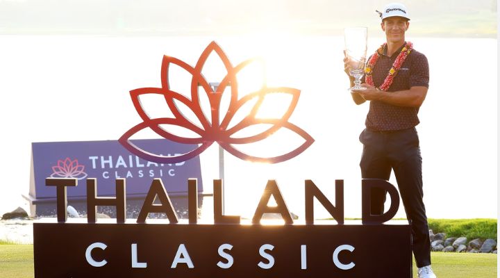 Thorbjorn Olesen holding the winners trophy at Thailand Classic 2023