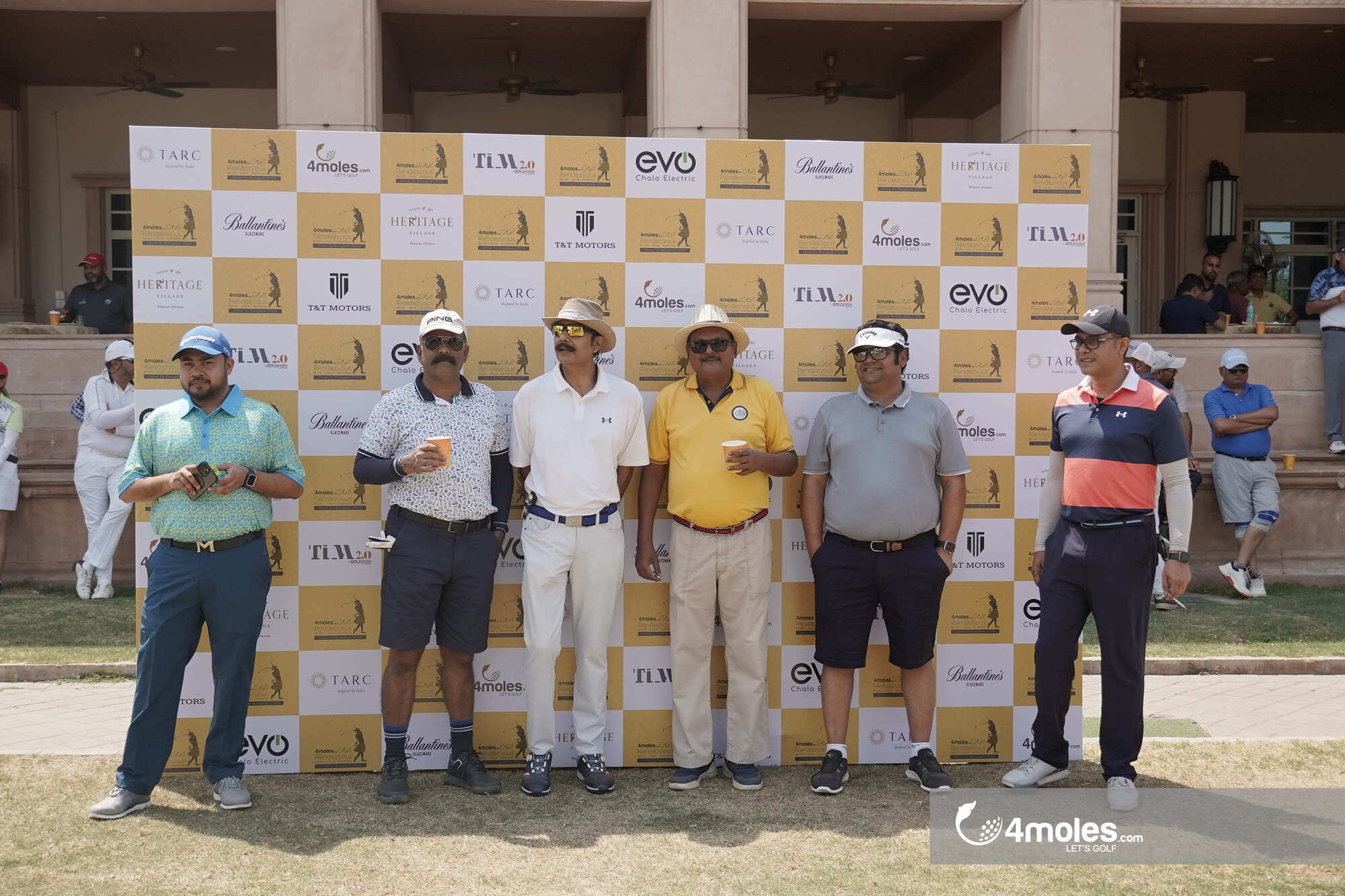 Golfers posing on the course