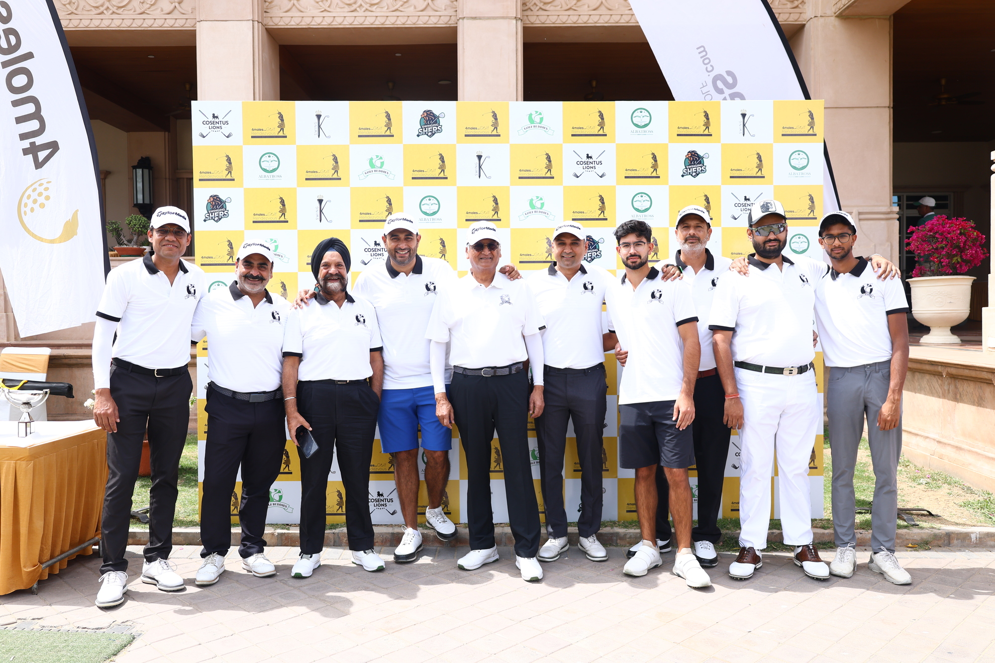 Team Golf Buddies poses for a group picture.