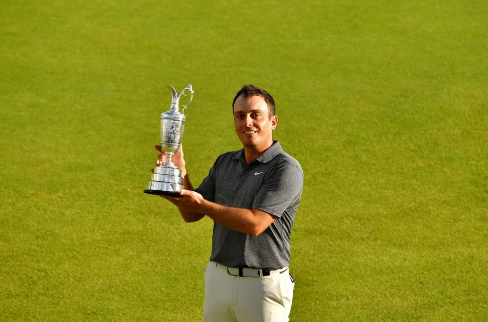 Italy’s Francesco Molinari holds off pack of stars to win the 2018 Open 