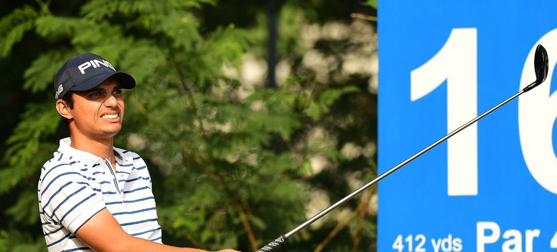 Ajeetesh Sandhu misses eagle on the 18th by an inch but a birdie was good enough to give him a share of lead