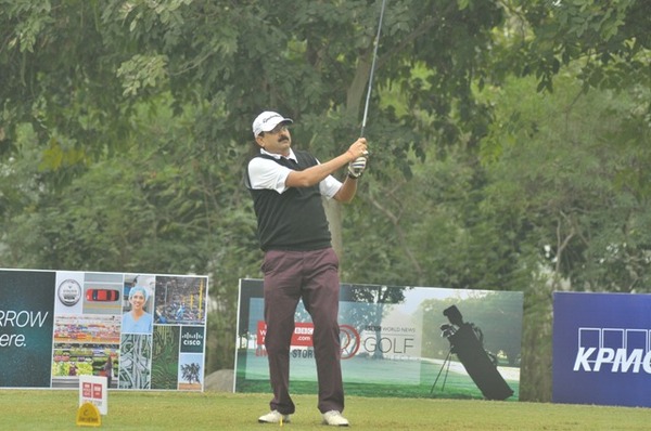 Mr. Manoj Sharan hits a tee shot