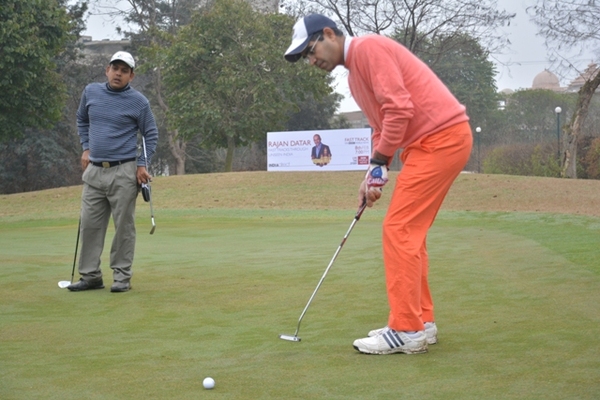 Mr. Ashish Chandiok hitting a putt