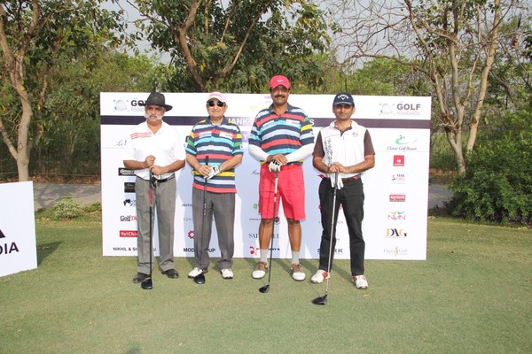 The 1st group about to tee off