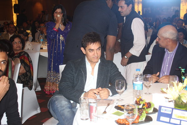 Aamir Khan watches intently