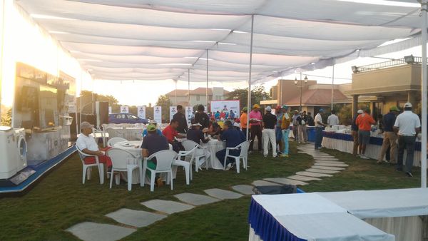 Corporate golfers gather and grab a quick bite before the tee-off at Lloyd BT Pro-Am 2016 - Ahmedabad Leg
