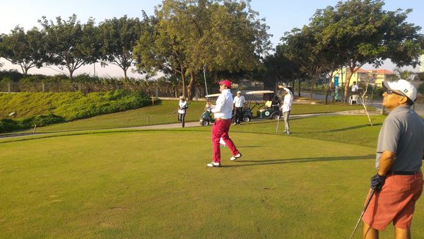 Mr. Pranav Kapadia hits a tee shot at the Par-3 11th Hole