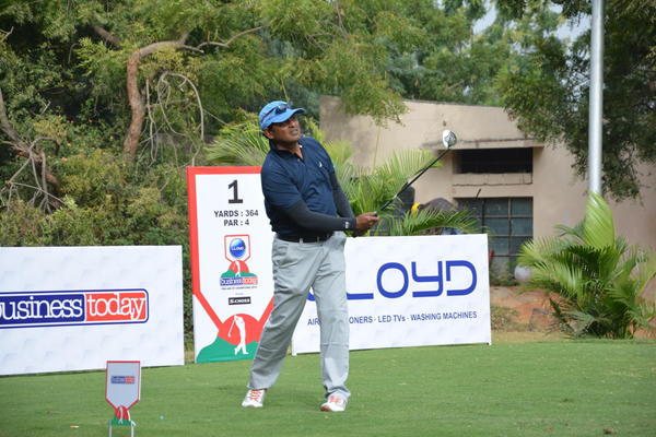Alla Dinesh tracks his ball after hitting it off the tee at the Hyderabad Golf Association Course