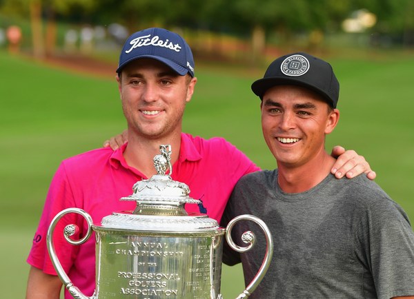 Rickie Fowler congratulates Justin Thomas on his win