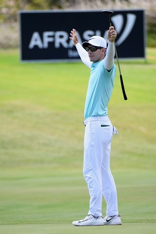 Dylan Frittelli of South Africa reacts after his birdie on the 10th during day four
