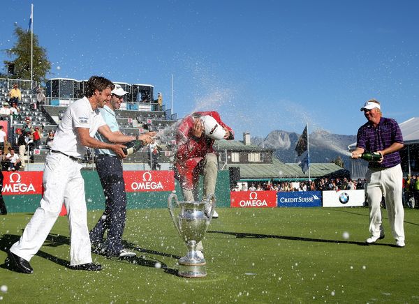 The winner Alexander Noren of Sweden being sprayed with champagne