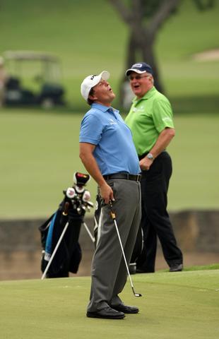 Phil MICKELSON in the practice round reacts after missing his putt in the practice round.