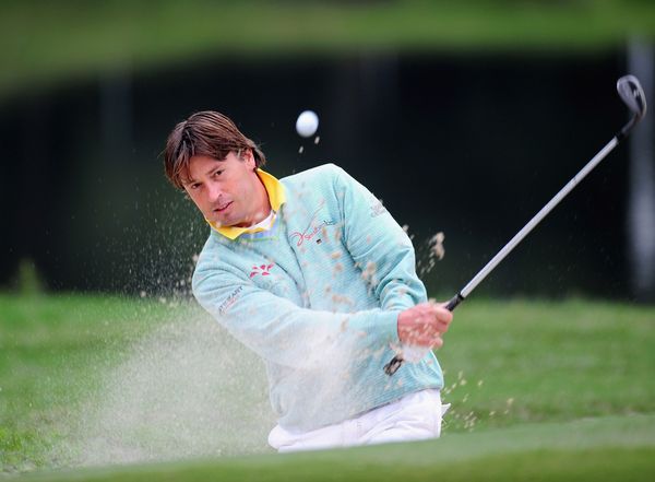 Robert - Jan Derksen of The Netherlands plays a bunker shot on the third hole during the third round of the UBS Hong Kong Open at the Hong Kong Golf Club