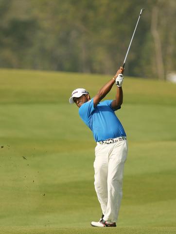 Anirban Lahiri (IND) with his approach shot on day 1.