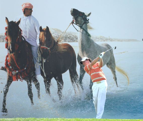 Rory McIlroy of Northern Ireland tees off at the par 3, 7th hole during the third round.