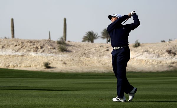 Sergio Garcia of Spain hits his second shot on the 15th hole during the first round.