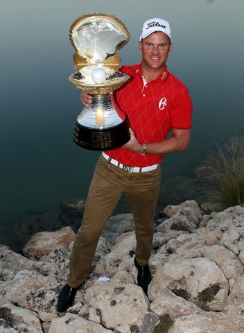 Robert Karlsson of Sweden with the trophy