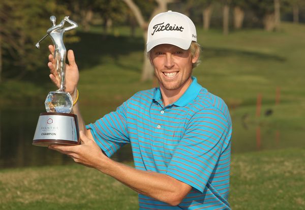 Andrew Dodt poses with the trophy