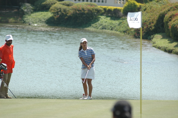 Megna Bal chipping on to the 9th green.