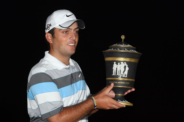 Francesco Molinari of Italy with the winner's trophy