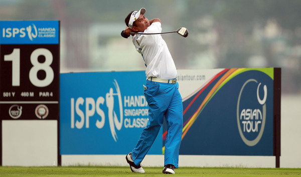 Thaworn Wiratchant of Thailand plays a shot during Day 2
