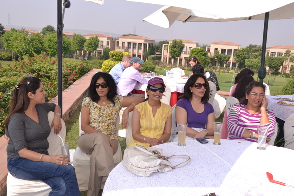 Golfing wives enjoying the morning sun, when the event was on.