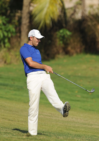South African Charl Schwartzel reacts after a shot on Day 2