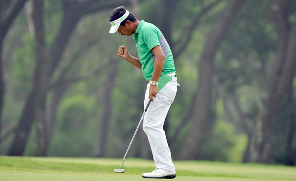 Lin Wen Tang (TPE) reacts after making a putt on Day 1