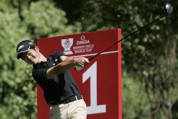 Liang Wen-chong of China hits his tee shot on the 11th hole during day 2.