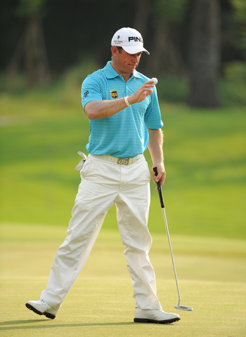 Title-defender Lee Westwood (ENG) responds to the crowd