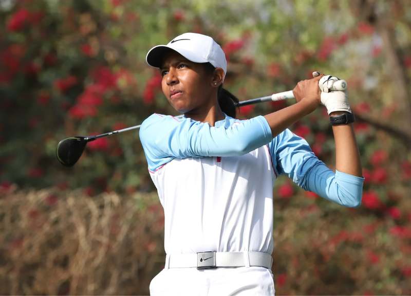 Avani Prashanth hitting a golf shot