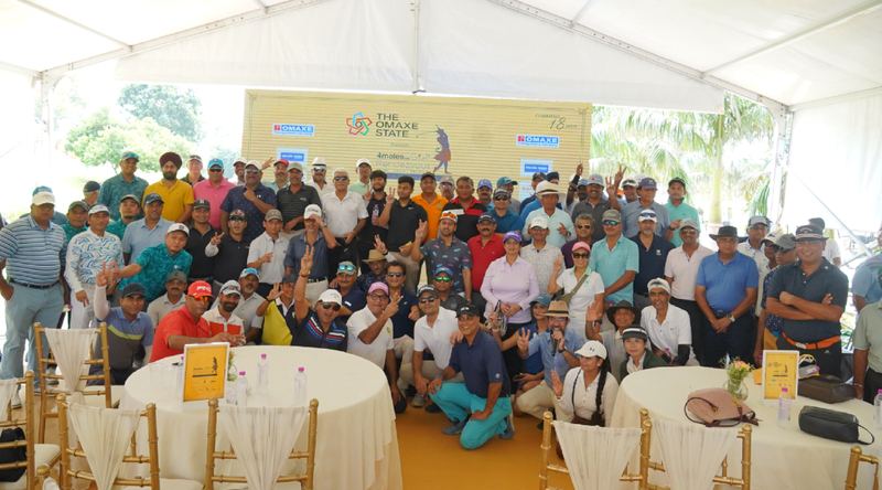 Gents, Veterans and Ladies golfers assembled on stage for a group photo